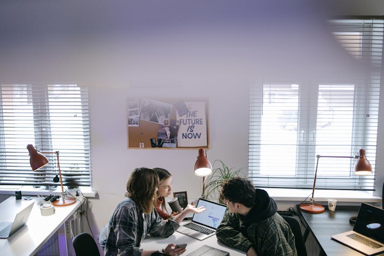 A small team working together at a desk